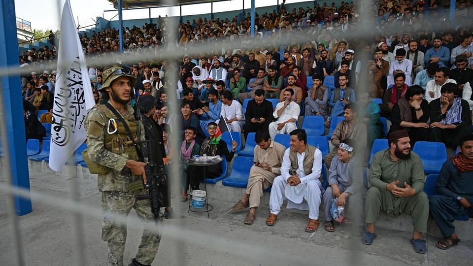 Taliban forces guard stadium during a T20 trial match being played between two Afghan teams in Kabul, Afghanistan on September 3, 2021.