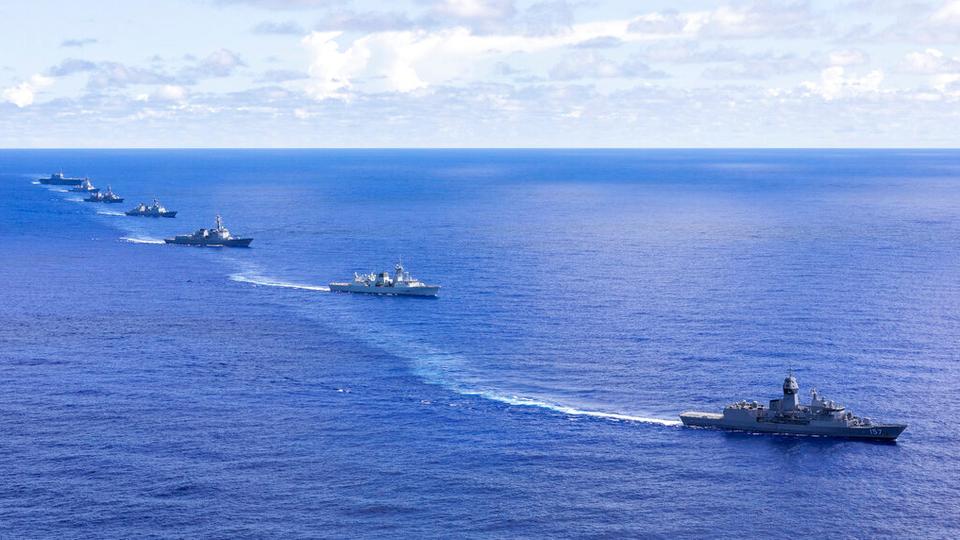 Naval ships from the Royal Canadian Navy, Japan Maritime Self-Defense Force and Republic of Korea Navy sail in formation alongside HMA Ships Sydney and Perth for Exercise Pacific Vanguard during a Regional Presence Deployment, on Aug 22, 2022.