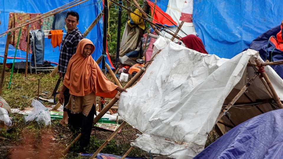 Displaced people are seen at a temporary shelter as they flee their house following an earthquake in Cianjur, West Java province, Indonesia, November 27, 2022.