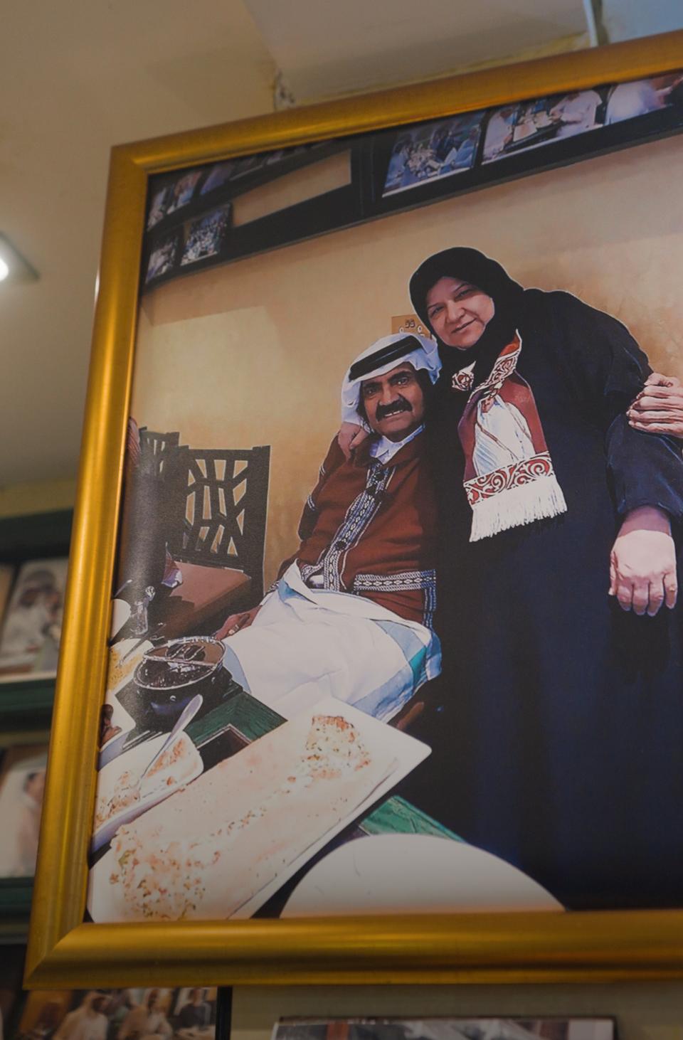 Shams al Qassabi with former ruling Emir of Qatar, Hamad bin Khalifa Al Thani. Shams is famous for promoting authentic Qatari culture and cuisine and serves as a symbol of financial independence for women in the Gulf nation.