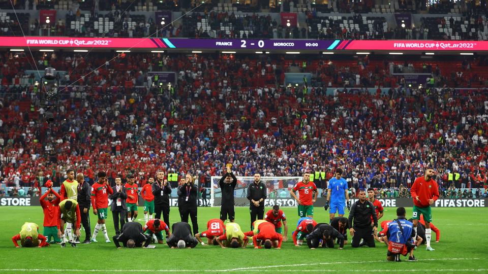 Long after the final whistle, when French team left the pitch, Morocco's players stayed on, basking in the love of a stadium and kneeling on the ground in prayer.