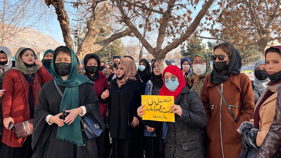 Afghan women chant slogans to protest against the ban on university education for women, in Kabul on December 22.