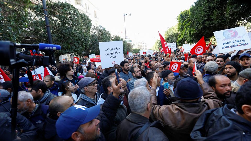 Demonstrators attend a protest against Tunisian President Kais Saied, on the anniversary of the 2011 uprising, in Tunis, Tunisia.