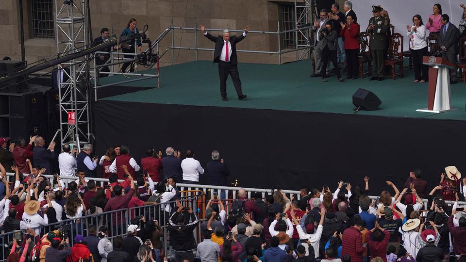 Lopez Obrador greets supporters at a rally to commemorate 85th anniversary of the 1938 expropriation of the country's oil industry.