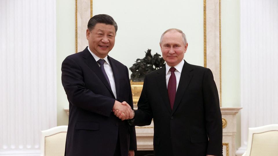 Russian President Vladimir Putin shakes hands with Chinese President Xi Jinping during a meeting at the Kremlin in Moscow on March 20, 2023.
