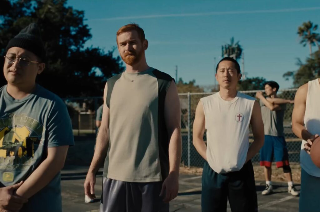 Steven Yeun (C-R) among other actors, in a scene from the TV series "Beef." (Screenshot from Netflix)
