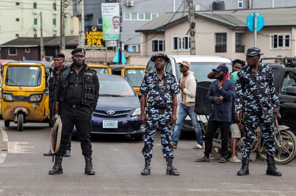 Security forces members stand guard during nationwide protests over the removal of fuel subsidies in Lagos, Nigeria, Aug. 2, 2023. (EPA Photo)