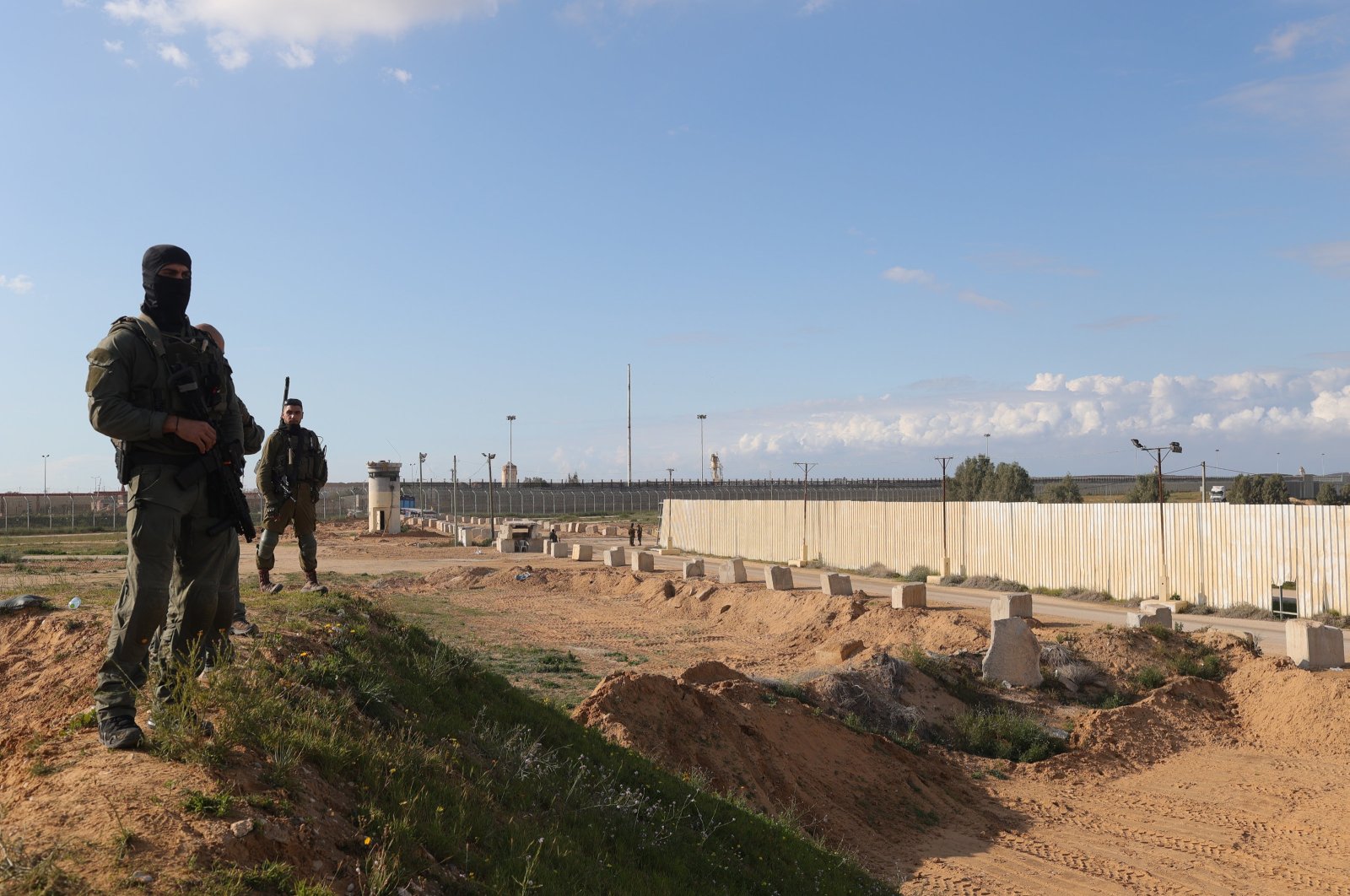 Border police watch over the Kerem Shalom border crossing, southern Israel, Jan. 29, 2024. (EPA Photo)