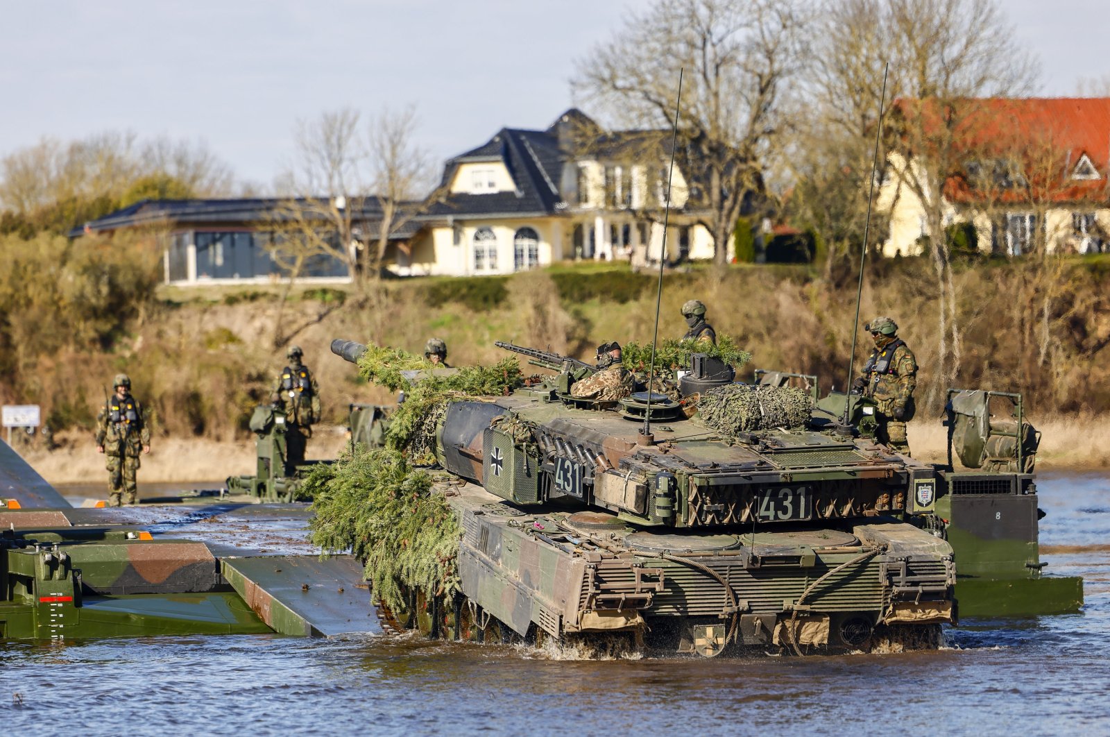 A Leopard 2 A7 main battle tank participates in a water crossing military exercise of an armored infantry brigade of the German armed forces "Bundeswehr," in Klietz, Germany, March 18, 2024. (EPA Photo)