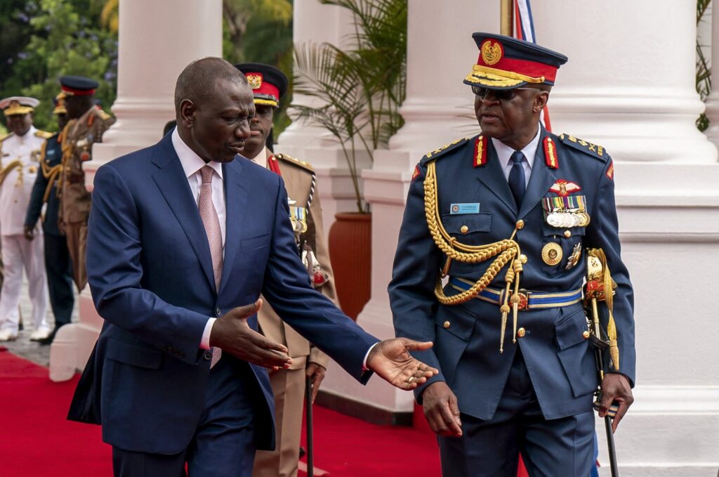 Chief of Kenya Defense Forces Gen. Francis Ogolla (R) speaks to Kenyan President William Ruto (L) and Kenyan first lady Rachel Ruto (unseen) as they prepare to receive Britain's King Charles III and Queen Camilla (unseen) during a ceremonial welcome, State House, Nairobi, Kenya, Oct. 31, 2023. (AFP Photo)