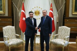 President Recep Tayyip Erdoğan and Kazakh Prime Minister Olzhas Bektenov shake hands in Türkiye's capital Ankara, April 25, 2024. (DHA Photo)