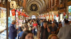 People are photographed at the famous Spice Bazaar in Eminönü neighborhood, Istanbul, Türkiye, April 5, 2024. (IHA Photo)