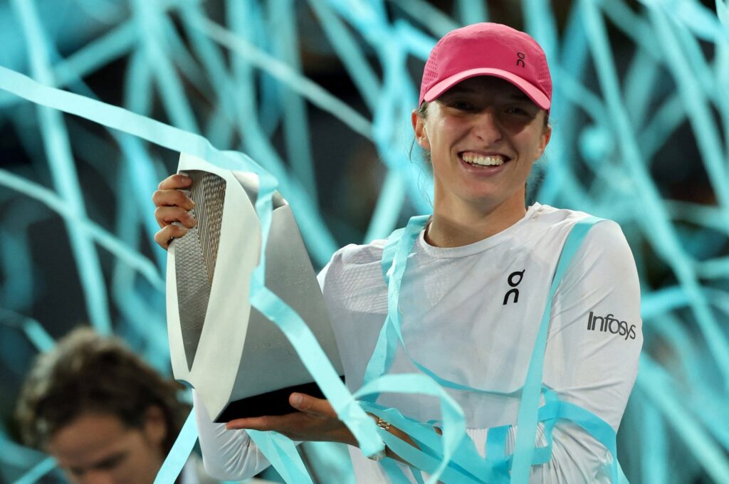 Poland's Iga Swiatek holds her trophy after beating Belarus' Aryna Sabalenka during the 2024 WTA Tour Madrid Open tournament final tennis match at Caja Magica, Madrid, Spain, May 4, 2024. (AFP Photo)