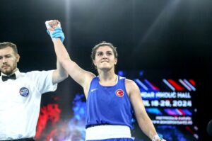 The referee announces Turkish boxer Busenaz Sürmeneli's victory after she beats Russia's Albina Moldazhanova during the European Wrestling Championships, Belgrade, Serbia, April 27, 2024. (AA Photo)