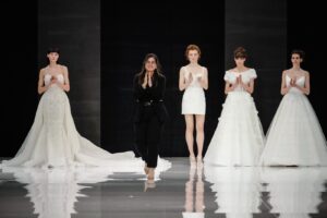 Seyhan Merve Şişman walks the runway with some of her bridal wear designs, which she has been designing in Australia for 10 years, eventually expanding her designs to more than 40 sales points in seven countries, Milan, Italy, April 7, 2024. (Sabah Photo)