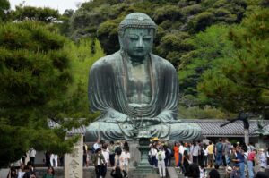 Tourists visit Kotokuin Temple to view and pray at the 13.35-meter (43.80-foot) tall Great Buddha of Kamakura, in Kamakura, south of Tokyo, Japan, April 21, 2024. (EPA Photo)