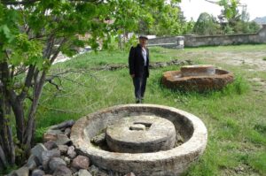 Old hand mills used for grinding flour and bulgur are now displayed as garden antiques, Sivas, central Türkiye, May 13, 2024. (IHA Photo)