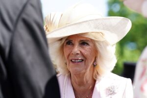 Britain's Queen Consort Camilla speaks with guests during the Sovereign's Creative Industries Garden Party at Buckingham Palace, London, Britain, May 15, 2024. (AFP Photo)