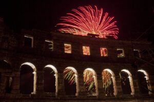 Fireworks marking the opening ceremony of an international film festival illuminate the Roman amphitheater, Pula, Croatia, July 21, 2012. (AP Photo)